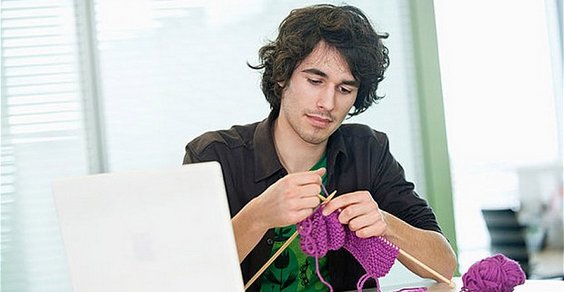 man knitting