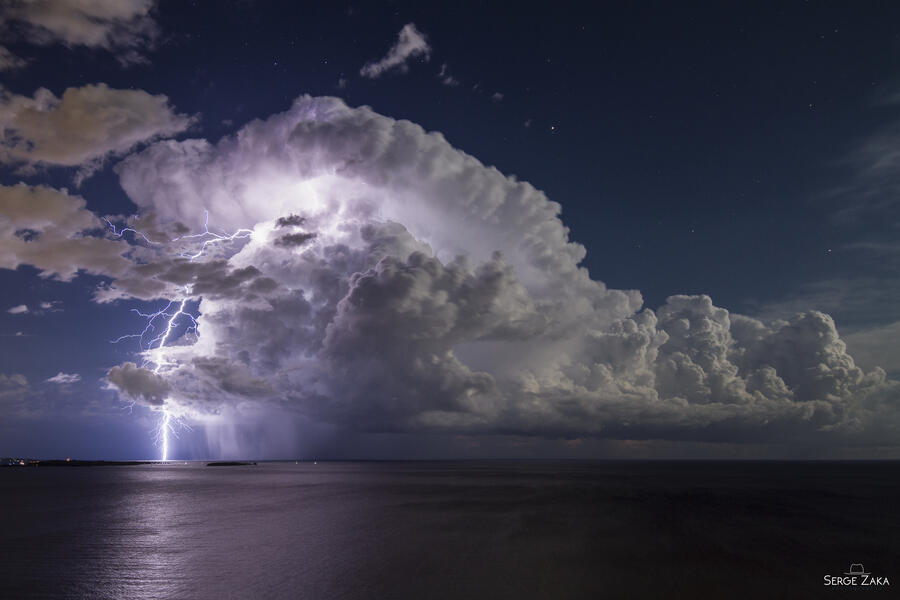 Serge Zaka with 'Lightning from an Isolated Storm over Cannes Bay'
